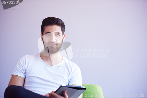Image of student working on tablet