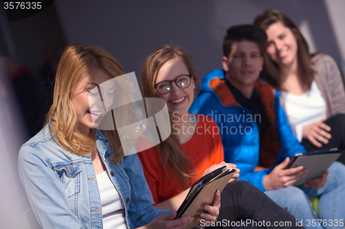Image of students group working on school  project  together