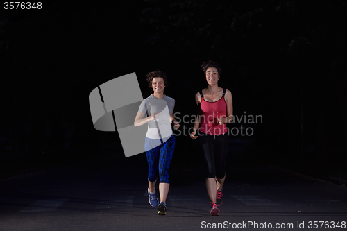 Image of couple jogging at early morning