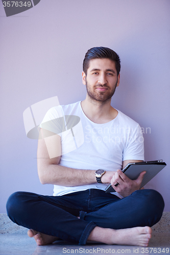 Image of student working on tablet