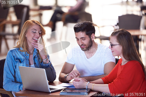 Image of students group working on school  project  together