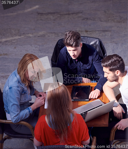 Image of students group working on school  project  together