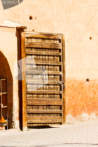 Image of old door in   africa   and wall ornate 