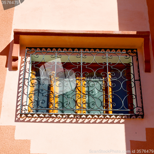 Image of   window in morocco africa old construction and brown wall  