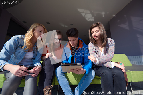 Image of students group working on school  project  together