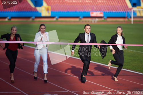 Image of business people running on racing track