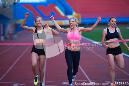 Image of Female Runners Finishing Race Together