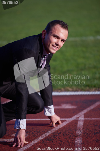 Image of business man ready to sprint