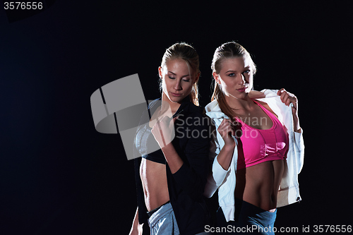 Image of sporty woman on athletic race track