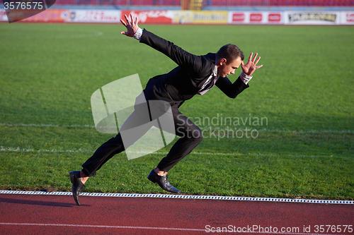 Image of business man ready to sprint