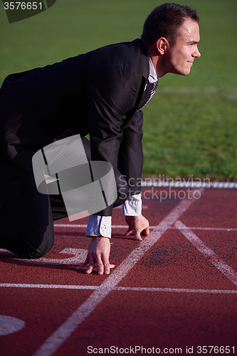 Image of business man ready to sprint