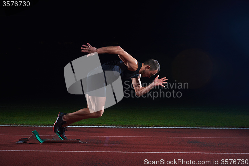 Image of Sprinter leaving starting blocks