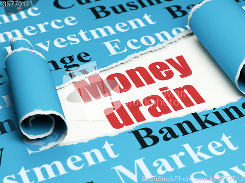 Image of Money concept: red text Money Drain under the piece of  torn paper