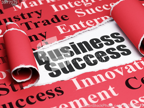 Image of Finance concept: black text Business Success under the piece of  torn paper