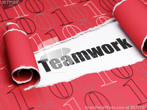 Image of Business concept: black text Teamwork under the piece of  torn paper