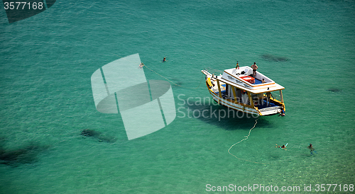 Image of Boat in a Crystalline sea beach in Fernando de Noronha,Brazil