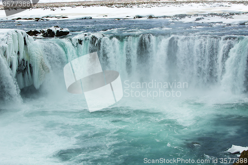 Image of Icelandic waterfall Godafoss in wintertime