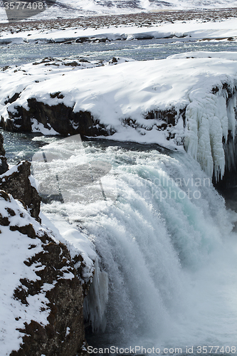 Image of Closeup of frozen waterfall Godafoss, Iceland