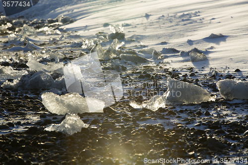 Image of Ice blocks at glacier lagoon Jokulsarlon, Iceland in evening lig