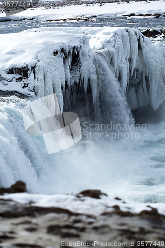 Image of Closeup of frozen waterfall Godafoss, Iceland