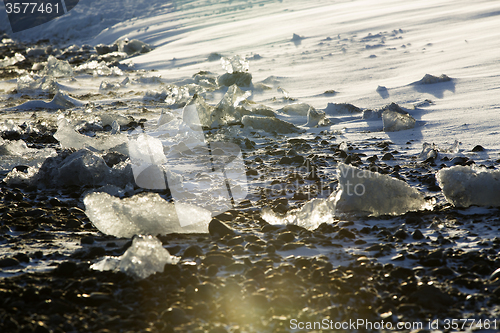 Image of Ice blocks at glacier lagoon Jokulsarlon, Iceland in evening lig