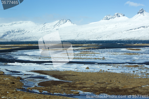 Image of Snow-covered volcanic mountain landscape