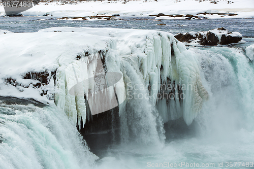 Image of Closeup of frozen waterfall Godafoss, Iceland