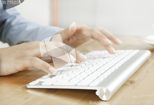 Image of Beautiful fingers with keyboard