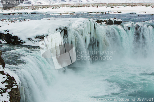 Image of Closeup of frozen waterfall Godafoss, Iceland