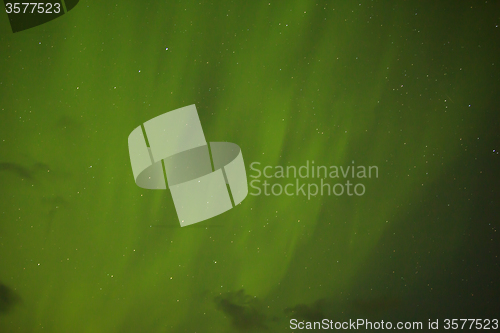 Image of Northern lights with bright stars in Iceland