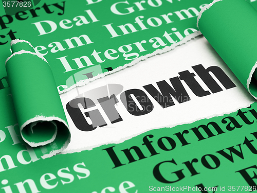 Image of Finance concept: black text Growth under the piece of  torn paper