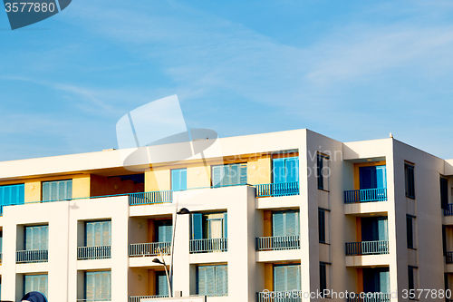 Image of blue in morocco  construction and brown wall   