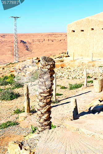 Image of carpet  in      morocco atlas dry mountain utility pole 