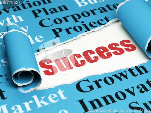 Image of Business concept: red text Success under the piece of  torn paper