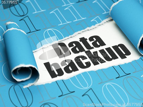 Image of Information concept: black text Data Backup under the piece of  torn paper