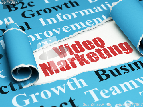 Image of Finance concept: red text Video Marketing under the piece of  torn paper