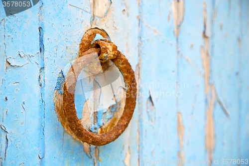 Image of morocco knocker in africa the old wood  facade  