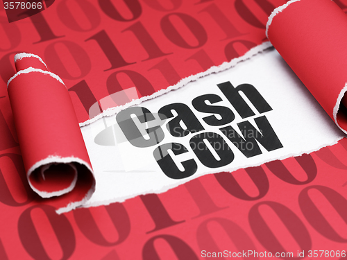 Image of Finance concept: black text Cash Cow under the piece of  torn paper