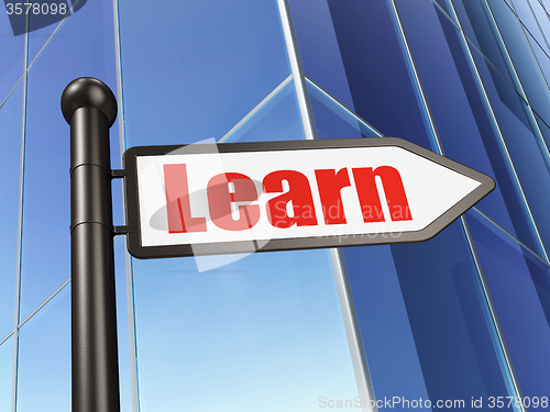 Image of Studying concept: sign Learn on Building background