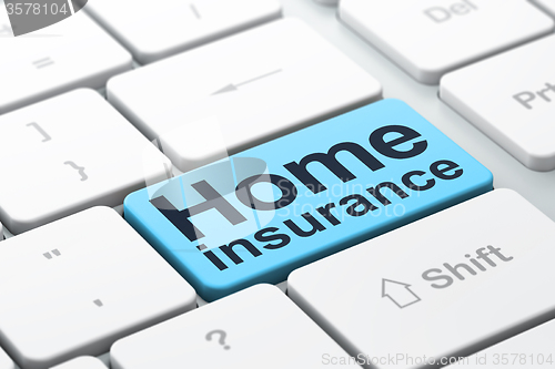 Image of Insurance concept: Home Insurance on computer keyboard background