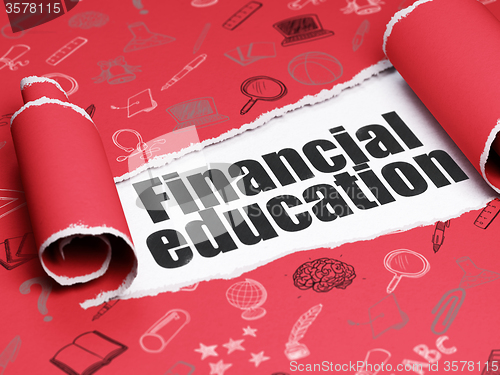 Image of Learning concept: black text Financial Education under the piece of  torn paper
