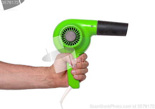 Image of Old green hairdryer in hand