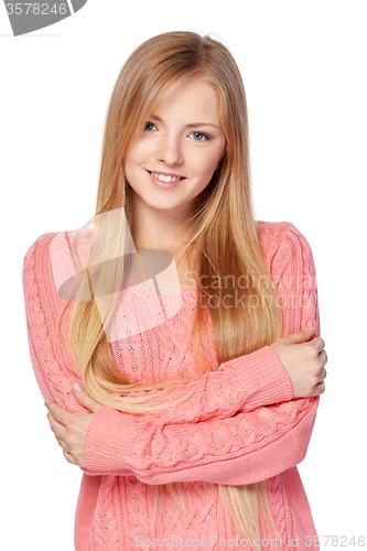 Image of Woman in pink sweater