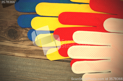 Image of colored construction gloves