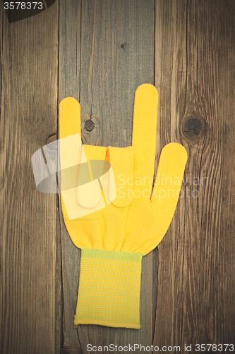 Image of yellow glove