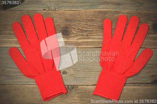 Image of red working gloves