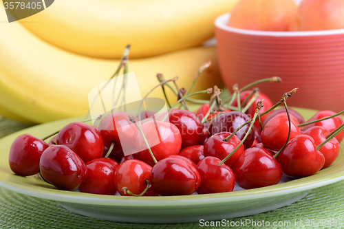 Image of Composition with fruits cherry bananas apricot