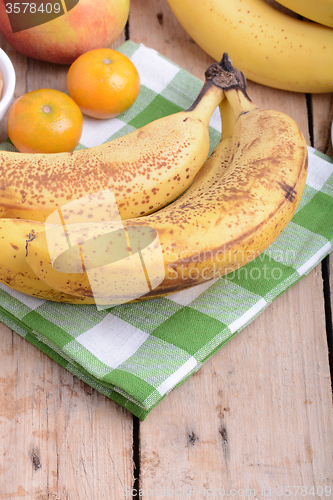 Image of mandarin, bananas and apples, health fresh food close up