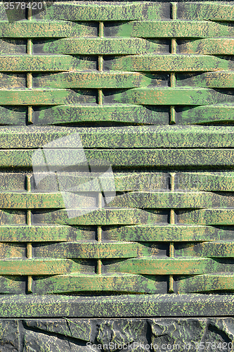 Image of Green metal texture with patches of rust steel on its surface, taken outdoor