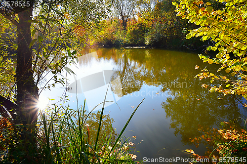 Image of Colorful autumn sunset on the river 